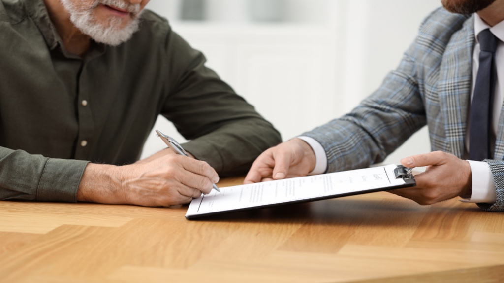 person writing a will