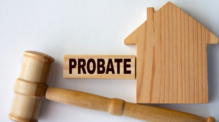 Wooden house and gavel with a probate sign