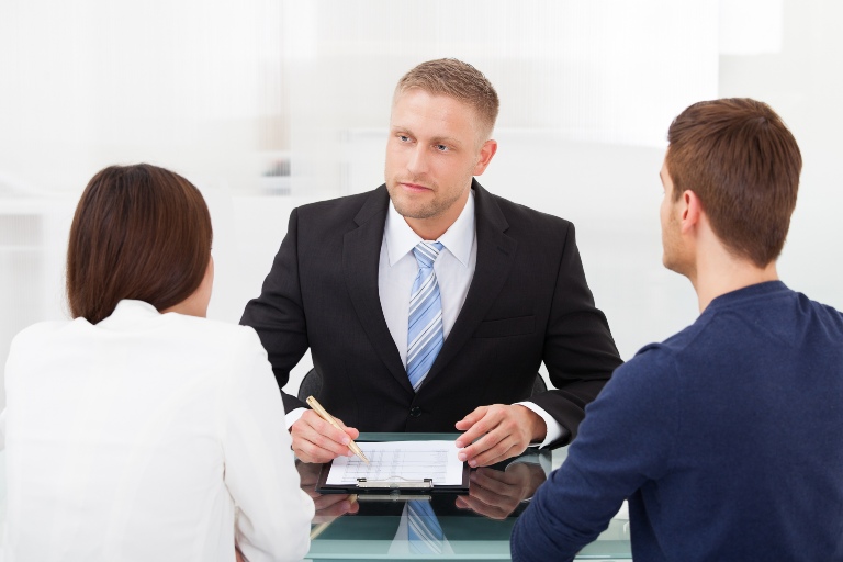 Lawyer talking to a couple