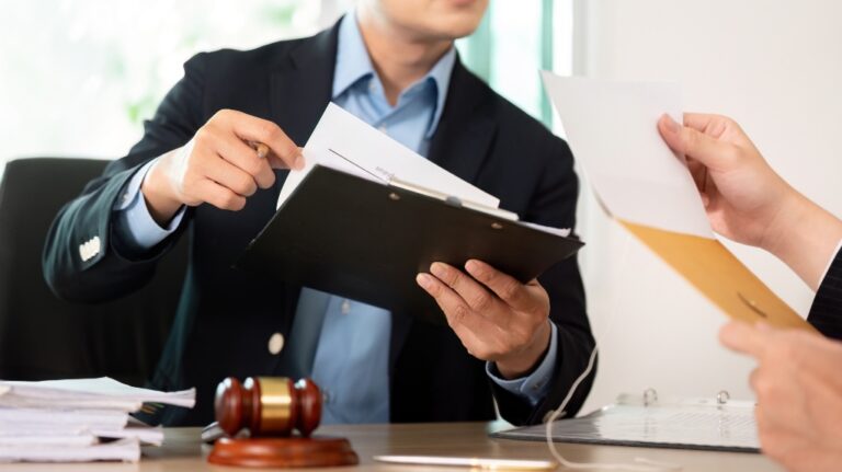 Lawyer discussing case details with client